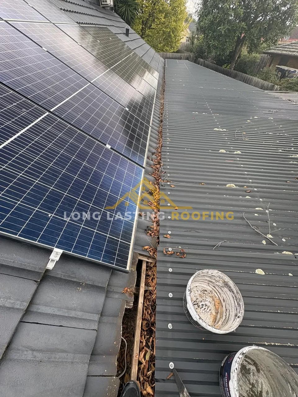 Gutter Clean Beside Solar Panels in Preston, Melbourne