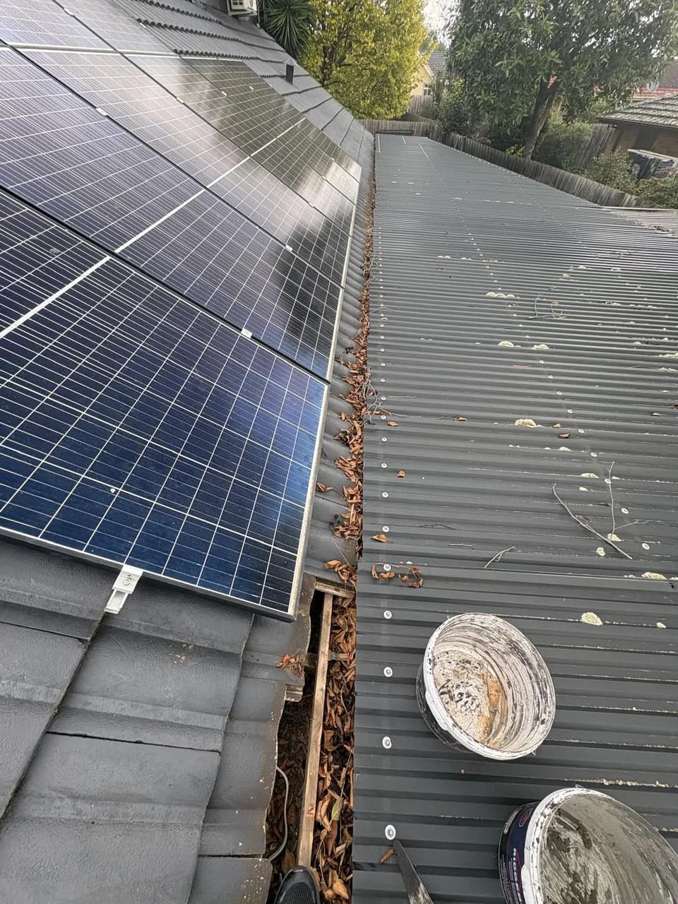 Gutter Clean Beside Solar Panels in Preston, Melbourne