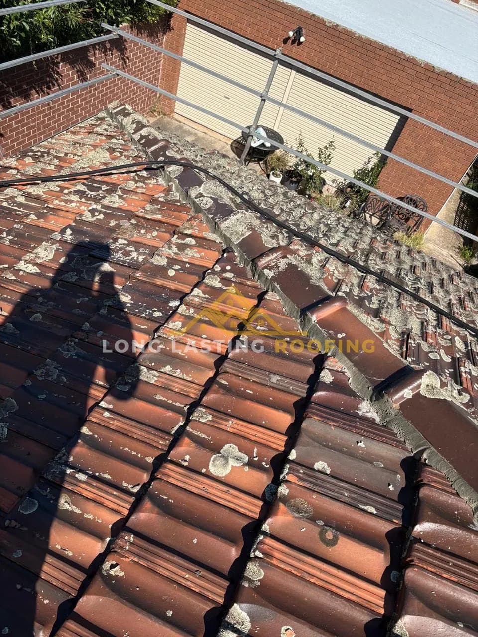 Ridge Capping Stripped for Repair in Oak Park, Melbourne